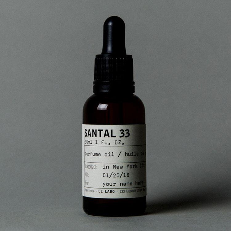 improve-mood-luxury-home-scents-santal33 A jar with droplet lid of Santaler33 perfume oil.