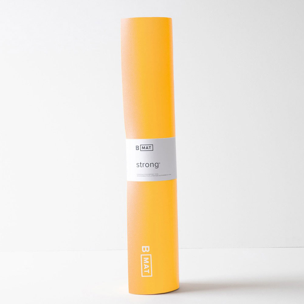 This thick yoga matt rolls up easily