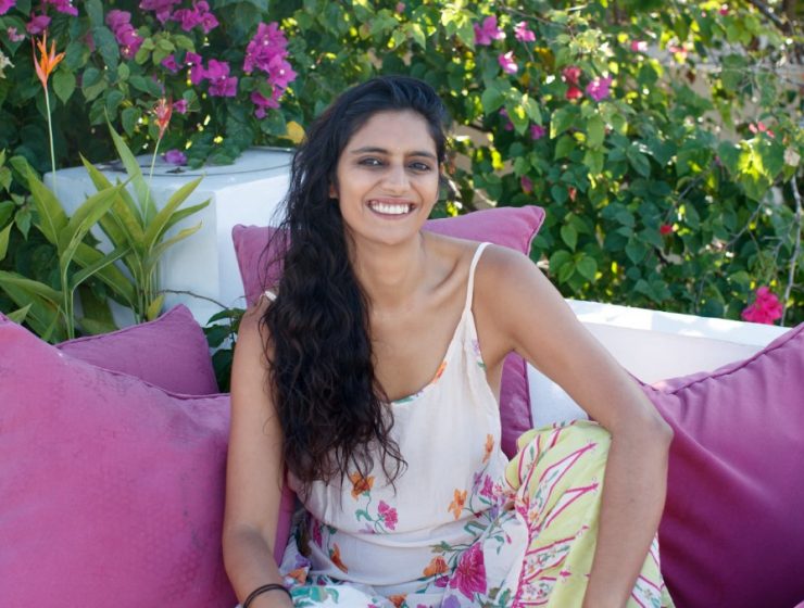 author-sitting-in-lush-garden