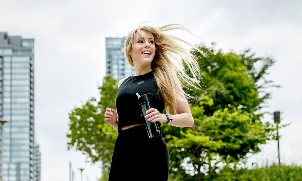 eva redpath works out on outdoor stairs