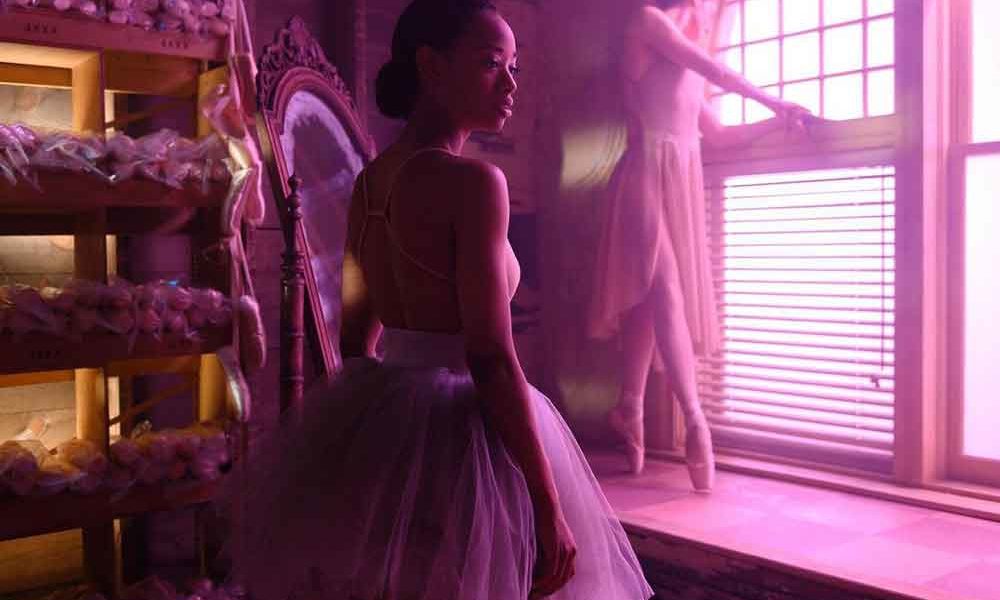 Actress Kylie Jefferson is all dressed in pink as the character Neveah Stroyer on Tiny Pretty Things