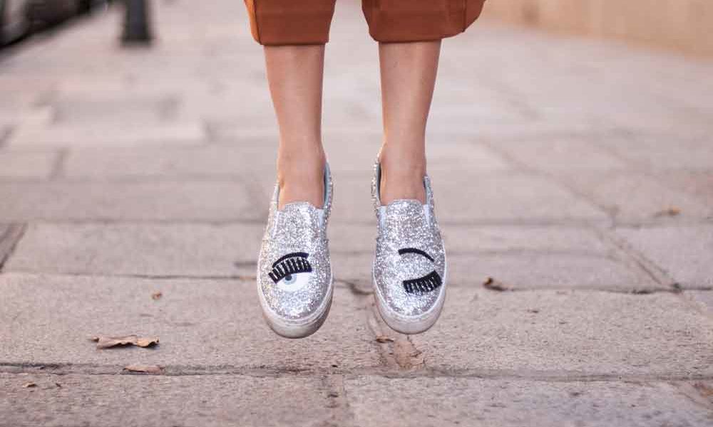 Fun and cheeky walking shoes with graphics of eyelashes and a wink. ;)