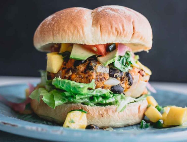 A hearty veggie burger with a patty that's made with chunks of vegetables