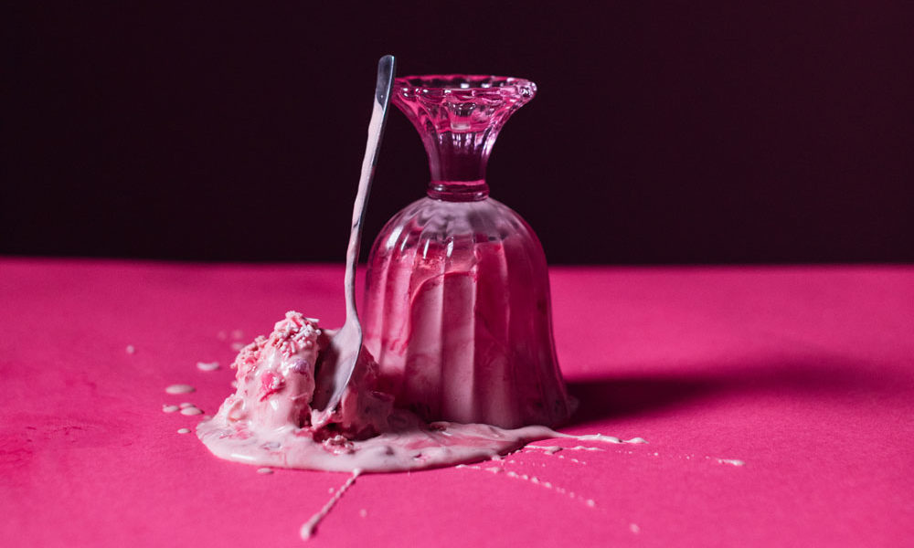 Playing with the drama around sugar, this is a photo of a sprinkled sundae dumped over.