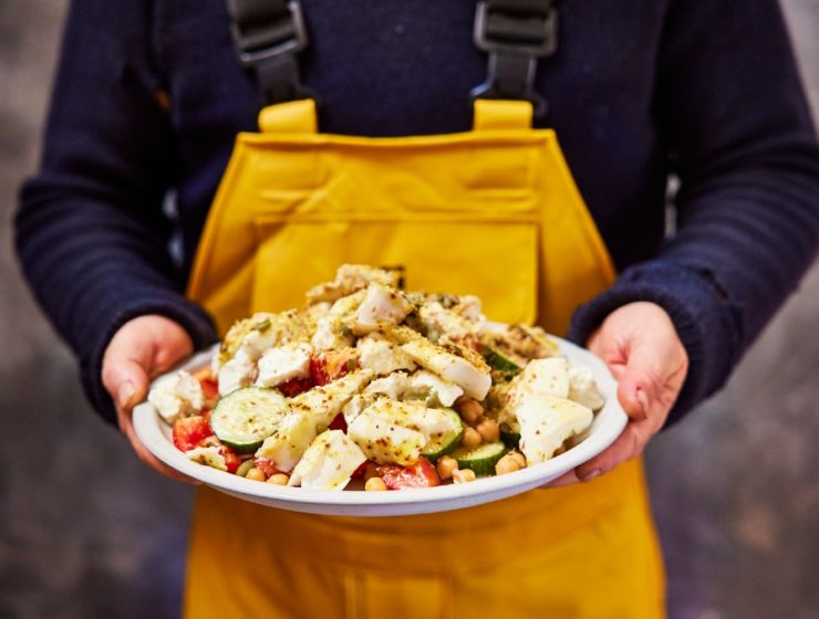 man-holding-fish-salad