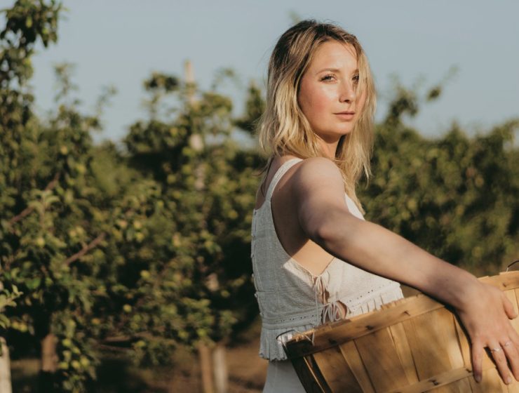 woman-holding-fruit-basket