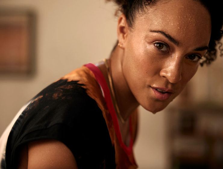 Peloton Guide Review: image features a woman who just worked out.