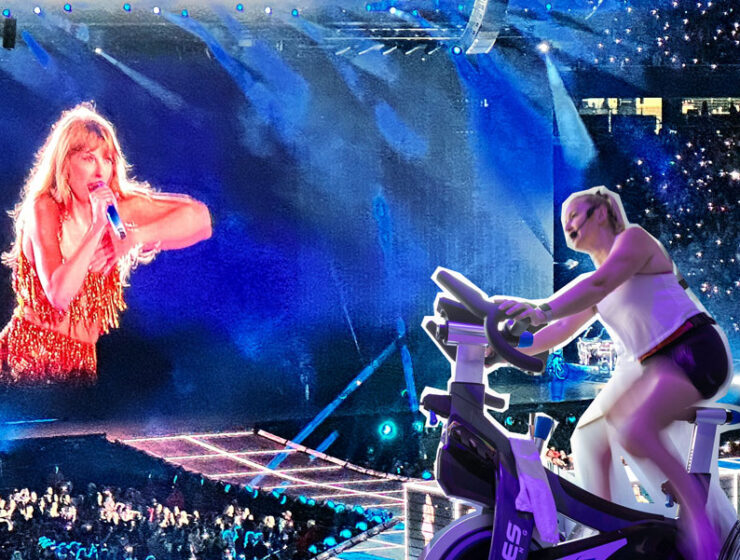 Kardia owner Heather Gardner spinning in front of Taylor Swift performing at a concert.