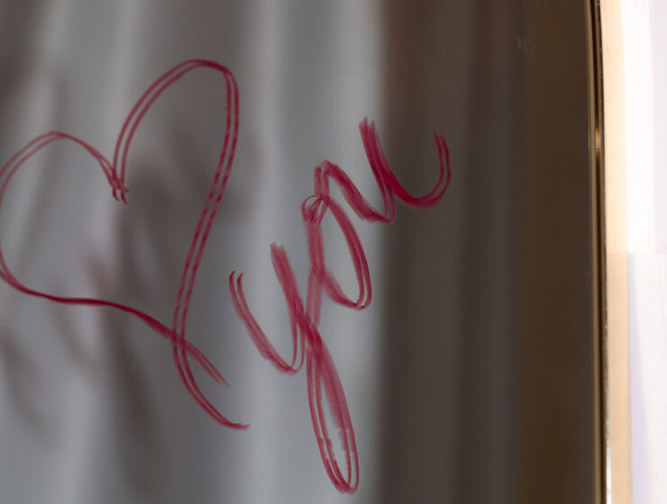 "Love you" on a mirror, as the answer to why dating is so hard.