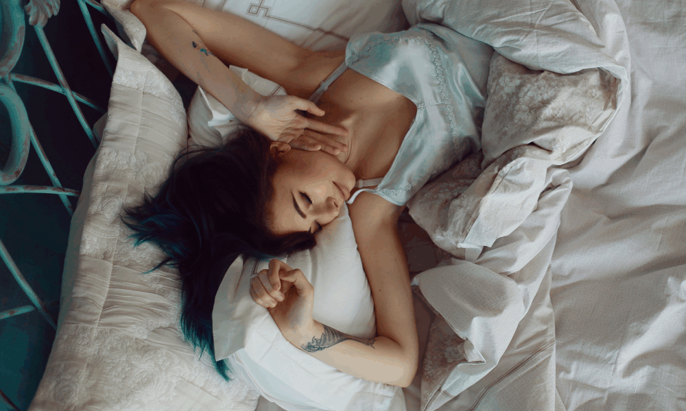 Canadian woman looking rested after spending a day in bed nursing a viral illness.