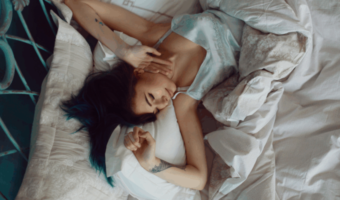 Canadian woman looking rested after spending a day in bed nursing a viral illness.