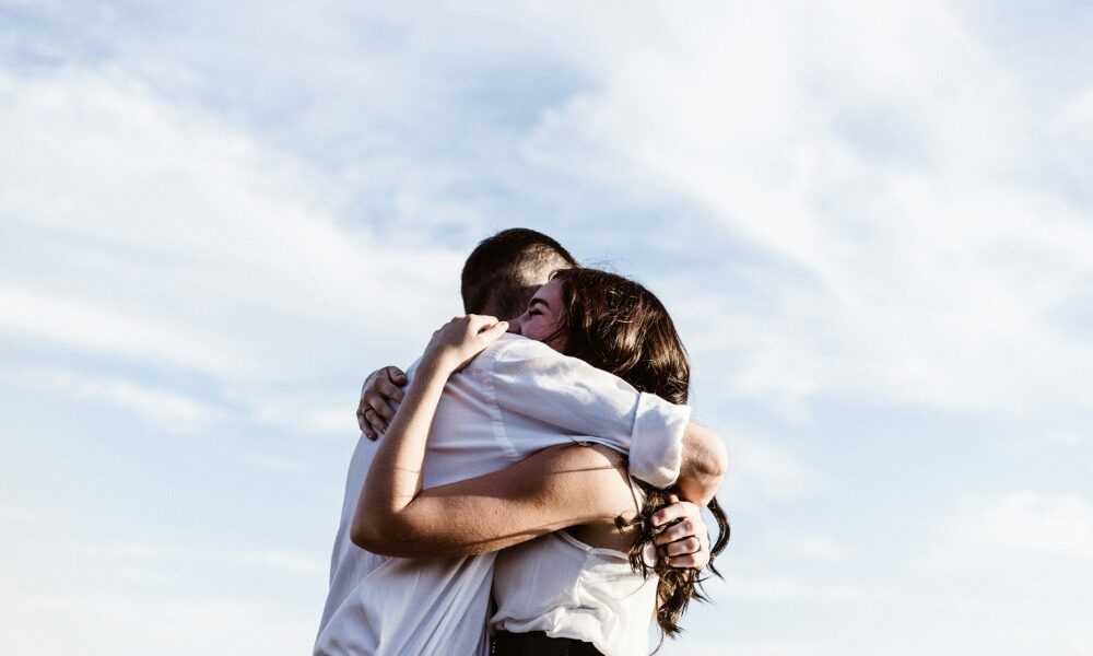 A couple hugging, demonstrating that relationships with mental health need support.