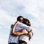 A couple hugging, demonstrating that relationships with mental health need support.